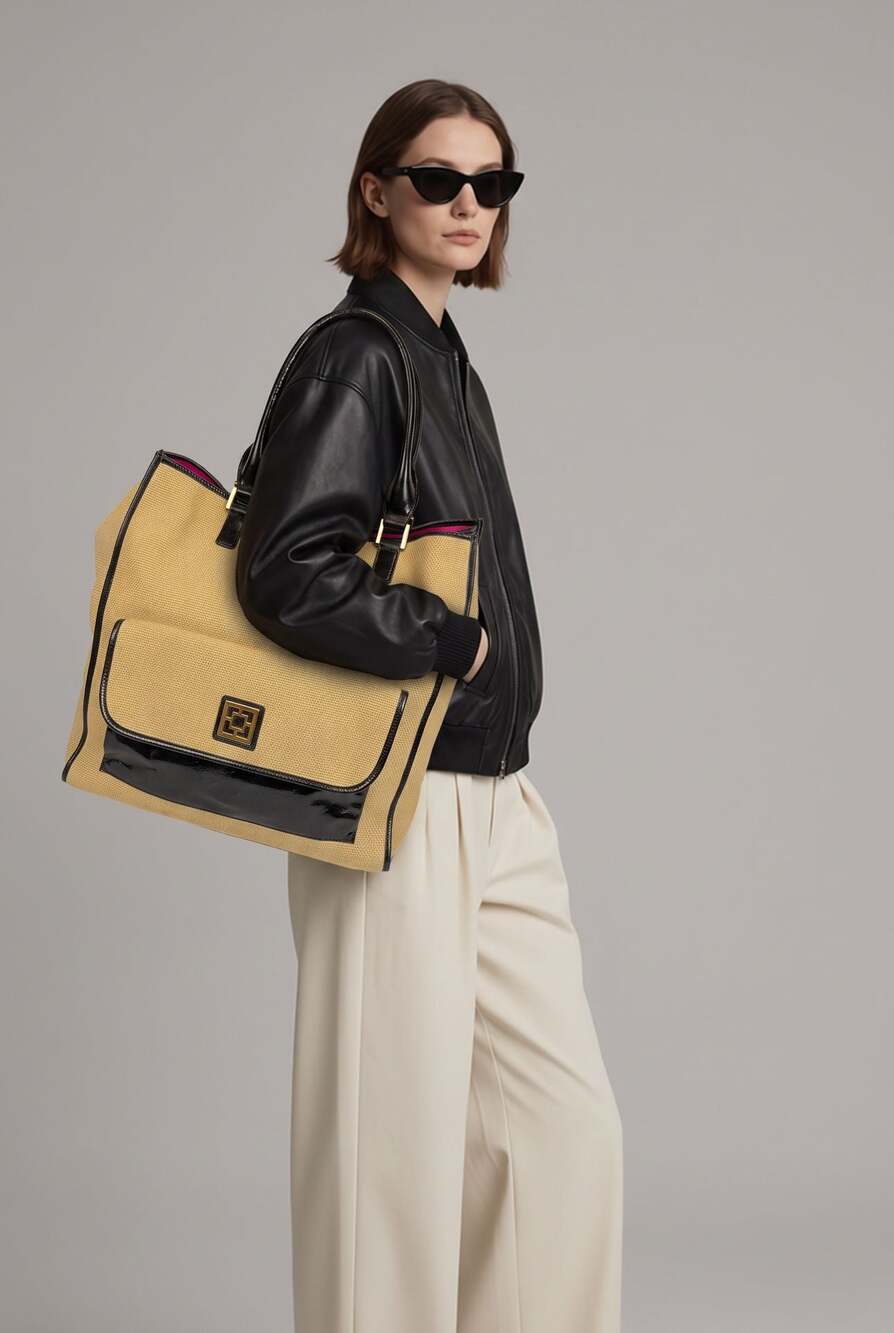 Trina Turk Tan Tote with Black Trim and Pink Lining